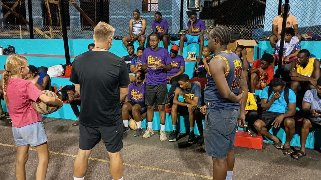Participants in the 2025 International Basketball Summer Camp under the watchful eye of Coach Cameron Turner of the Eastern Arizona Men’s Basketball Team.