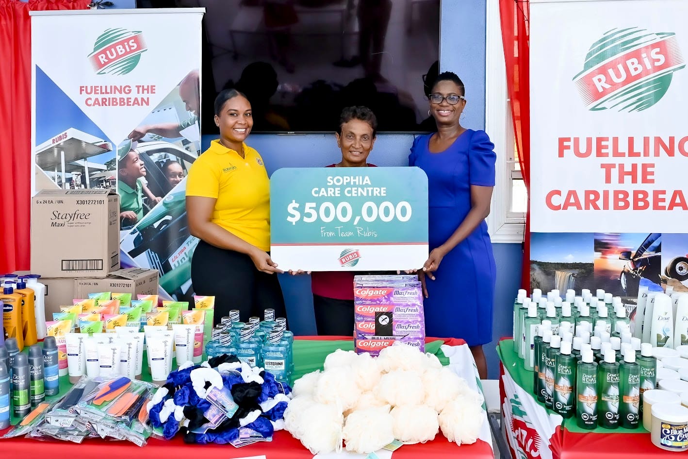 At the presentation, from left, are Natasha Brown, Sales & Marketing Coordinator, RUBIS; Khemwatti Dasrath, Social Services Assistant, Sophia Care Centre; and Joylyn Johnson, Accounts Executive, RUBIS.
