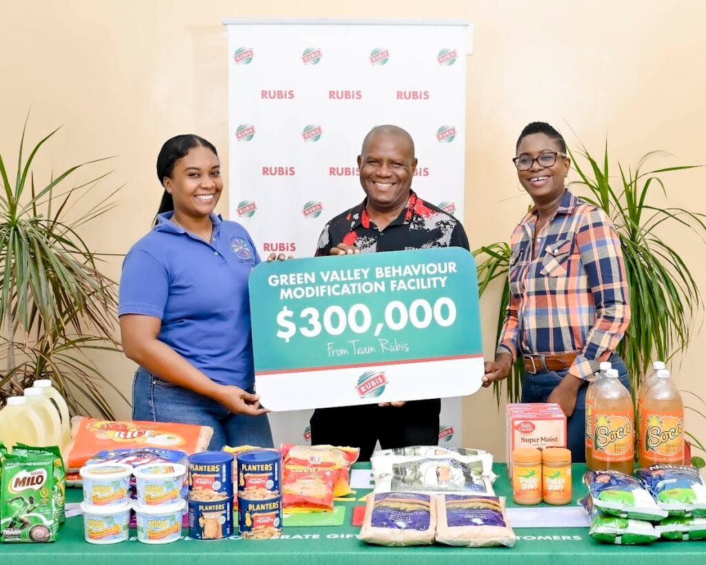 Spreading cheer from left are Natasha Brown, Sales & Marketing Coordinator, RUBIS, Wendell Jeffrey, Founder GVBMF, and Joylyn Johnson, Retail Accounts Executive, RUBIS.
