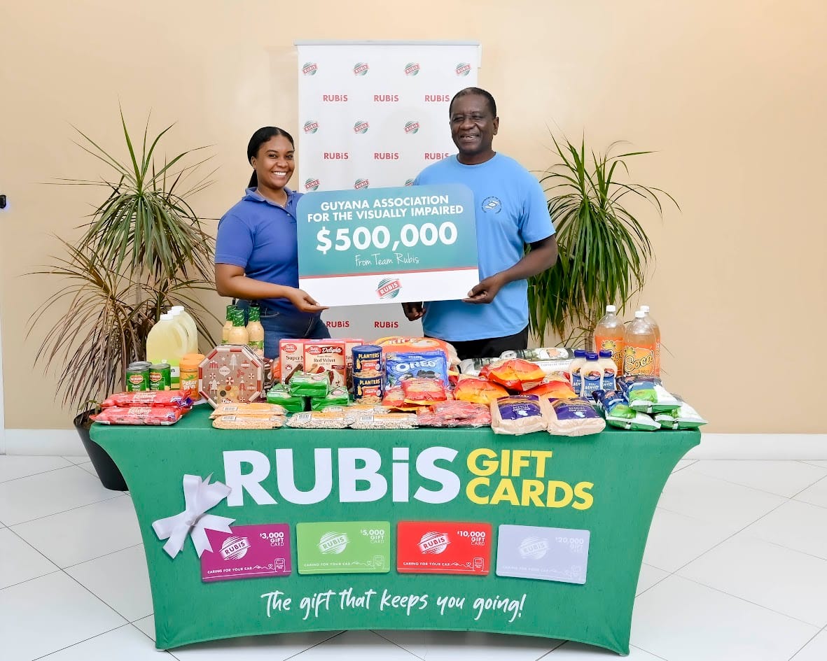 Natasha Brown, Sales and Marketing Coordinator, RUBIS, made the presentation to Leon Amsterdam, President of GAVI.